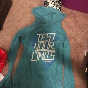 Reebok XS long sleeve workout shirt.